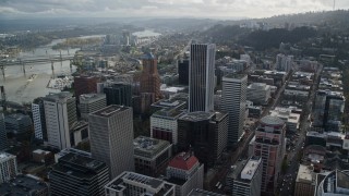 AX154_245 - 5.5K aerial stock footage flying over KOIN Center, Wells Fargo Center, and 200 Market in Downtown Portland, Oregon
