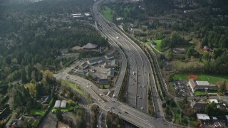 AX154_249E - 5.5K aerial stock footage flying over suburban homes and Highway 26 in Southwest Portland, Oregon