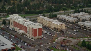 AX155_004E - 5.5K aerial stock footage approaching Embassy Suites in Hillsboro, Oregon