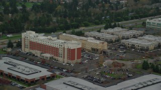 AX155_005 - 5.5K aerial stock footage tracking Embassy Suites buildings in Hillsboro, Oregon