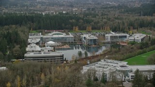AX155_011 - 5.5K aerial stock footage passing by Nike Headquarters office buildings in Beaverton, Oregon