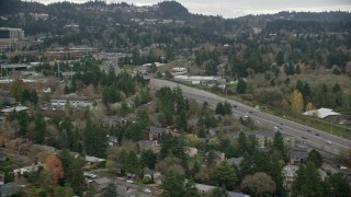 AX155_013 - 5.5K aerial stock footage of light traffic on Highway 217 in autumn, Southwest Portland, Oregon
