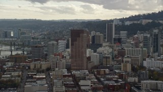 AX155_039E - 5.5K aerial stock footage of US Bancorp Tower and skyscrapers in Downtown Portland, Oregon