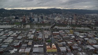 AX155_044 - 5.5K aerial stock footage of bridges over the Willamette River leading to Downtown Portland, Oregon