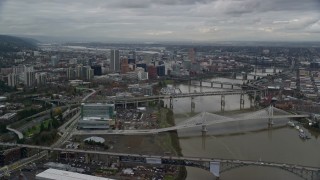 AX155_047E - 5.5K aerial stock footage of Willamette River and bridges near Downtown Portland, Oregon
