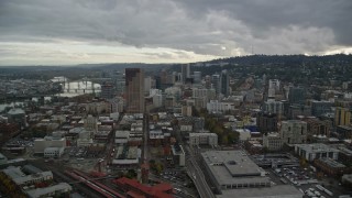 AX155_053E - 5.5K aerial stock footage flying away from skyscrapers, downtown buildings, and US Bancorp Tower, reveal Willamette River in Downtown Portland, Oregon