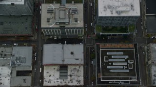 AX155_088E - 5.5K aerial stock footage of a bird's eye view of NW 12th Avenue and buildings in Downtown Portland, Oregon