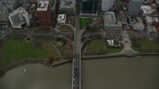 AX155_095E - 5.5K aerial stock footage of a bird's eye view of the Hawthorne Bridge becoming SW Madison Street and the waterfront park in Downtown Portland, Oregon