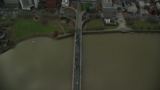 AX155_096 - 5.5K aerial stock footage of a bird's eye view of the Hawthorne Bridge becoming SW Madison Street and the waterfront park in Downtown Portland, Oregon