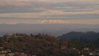 AX155_136 - 5.5K aerial stock footage of Mount Hood seen from hillside homes in Northwest Portland, Oregon