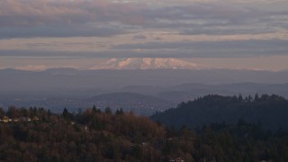 AX155_136E - 5.5K aerial stock footage of Mount Hood seen from hillside homes in Northwest Portland, Oregon