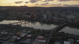 AX155_178 - 5.5K aerial stock footage approaching the Willamette River and Downtown Portland at twilight in Oregon