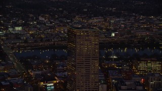 AX155_274 - 5.5K aerial stock footage orbiting the top of US Bancorp Tower at night in Downtown Portland, Oregon