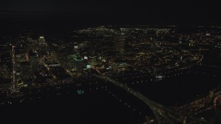 AX155_360 - 5.5K stock footage aerial video of Downtown Portland, the Morrison Bridge and the Burnside Bridge over Willamette River, night, Oregon