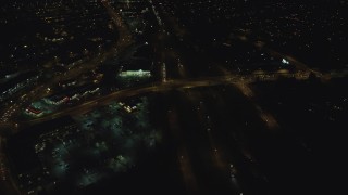 AX155_470 - 5.5K aerial stock footage following light traffic on Highway 26 at night, Beaverton, Oregon