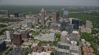 AX36_010E - 4.8K aerial stock footage approaching and flying by Midtown Atlanta skyscrapers, Georgia