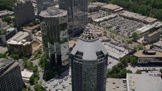 AX36_076 - 4.8K aerial stock footage approaching and tilting down to bird's eye of Buckhead Grand, Georgia