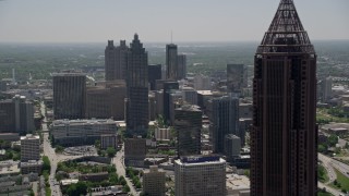 AX36_090E - 4.8K aerial stock footage flying by Bank of America Plaza revealing Downtown Atlanta skyscrapers, Georgia