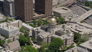 AX36_096E - 4.8K aerial stock footage orbiting Georgia State Capitol, Downtown Atlanta