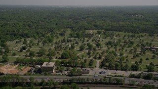 AX37_004E - 4.8K aerial stock footage approaching a cemetery, Atlanta, Georgia