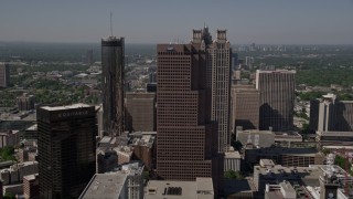 AX37_013E - 4.8K aerial stock footage flying by skysrapers, Downtown Atlanta, Georgia