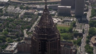 AX37_046 - 4.8K aerial stock footage of close-up orbiting the top of Bank of America Plaza, Atlanta, Georgia