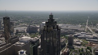 AX37_051E - 4.8K aerial stock footage orbiting top of SunTrust Plaza in Downtown Atlanta, Georgia