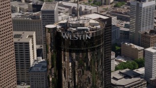 AX37_059 - 4.8K aerial stock footage orbiting top of Westin Peachtree Plaza Hotel, Downtown Atlanta
