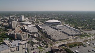 AX37_075E - 4.8K aerial stock footage tilt from elementary school in residential neighborhood, reveal Georgia Dome, Atlanta