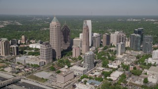 AX37_081E - 4.8K aerial stock footage approach and orbit Midtown Atlanta skyscrapers, Georgia