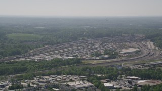 AX37_085 - 4.8K aerial stock footage approaching a train yard, Atlanta, Georgia