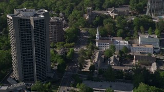 AX38_010E - 4.8K aerial stock footage approaching a church near condominium complexes, Buckhead, Georgia