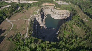 AX38_047 - 4.8K aerial stock footage approaching a quarry, West Atlanta, Georgia