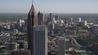 AX38_069E - 4.8K aerial stock footage approach and pass Bank of America Plaza and Midtown skyscrapers revealing Downtown skyscrapers, Atlanta