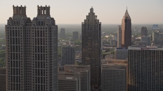AX39_018 - 4.8K aerial stock footage flying by sksycrapers revealing a row of sksycrapers, Downtown Atlanta, Georgia