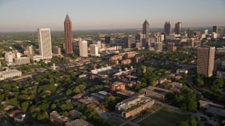 AX39_028E - 4.8K aerial stock footage of Midtown Atlanta skycrapers and Bobby Dodd Stadium, Atlanta, Georgia