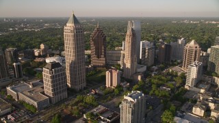 AX39_030E - 4.8K aerial stock footage approaching and orbiting One Atlantic Center to reveal more of Midtown Atlanta, Georgia