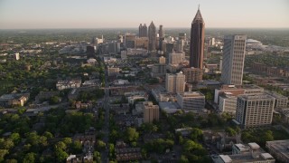AX39_034E - 4.8K aerial stock footage flying by Midtown Atlanta while approaching Downtown skyscrapers, Georgia