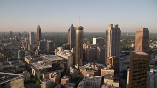 AX39_047E - 4.8K aerial stock footage flyby Downtown Atlanta skyscrapers to approach Midtown buildings, Georgia