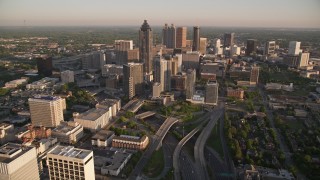 AX39_063E - 4.8K aerial stock footage following Downtown Connector toward Downtown skyscrapers, Atlanta