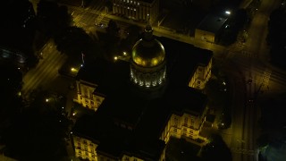 AX41_007 - 4.8K aerial stock footage approaching and tilting down on Georgia State Capitol, Downtown Atlanta, night