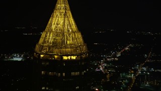 AX41_022E - 4.8K aerial stock footage orbiting top of Bank of America Plaza, Midtown Atlanta, Georgia, night