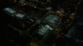 AX41_038E - 4.8K aerial stock footage approaching Lindbergh Center office buildings, Buckhead, Georgia, night