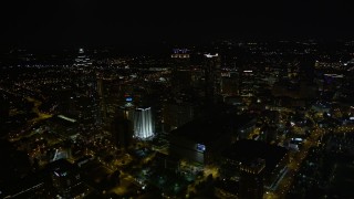 AX41_076 - 4.8K aerial stock footage approaching skyscrapers, Downtown Atlanta, Georgia, night