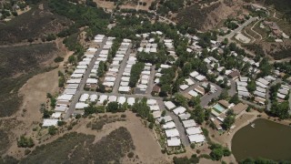 AX42_111 - 5K aerial stock footage approach a mobil home park in Agoura Hills, California