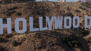 AX43_003 - 4K aerial stock footage passing the famous Hollywood Sign, Los Angeles, California