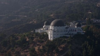 AX43_012 - 4K aerial stock footage orbiting around the Griffith Observatory, Los Angeles, California