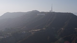 AX43_015 - 4K aerial stock footage approaching the iconic Hollywood Sign, Los Angeles, California