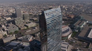 AX43_020 - 4K aerial stock footage flying by the top of The Ritz-Carlton, Downtown Los Angeles, California