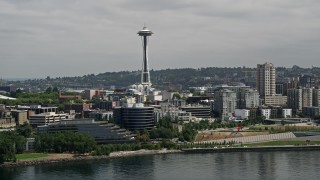 AX45_028E - 5K aerial stock footage tilting from Elliott Bay to reveal the Space Needle, Seattle, Washington